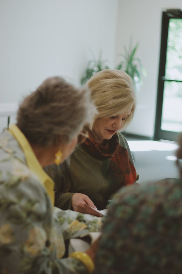 Women engaged in a Bible study session at a local church in Brevard, NC.